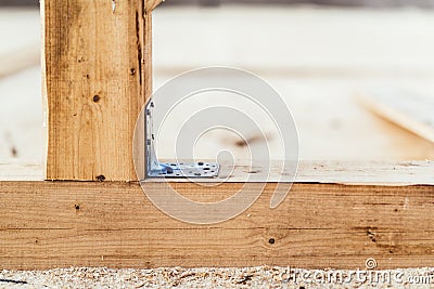 Building details, construction details with steel corner ribbed fixing plate Stock Photo