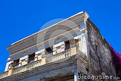 Building in disrepair with typical Caribbean architecture Stock Photo