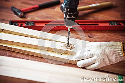 Building DIY with drilling machine. Professional carpenter worki Stock Photo