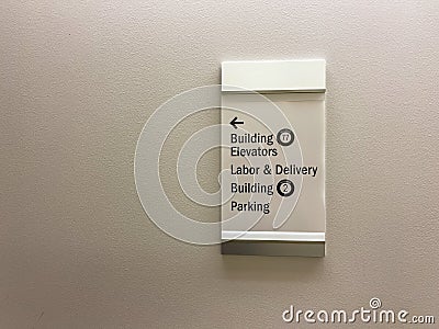 The building elevator, labor and delivery and parking sign for a hospital Editorial Stock Photo