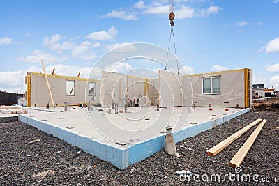 Building the energy efficient house. Structural insulated panels with plastic tubes in foundation. Stock Photo