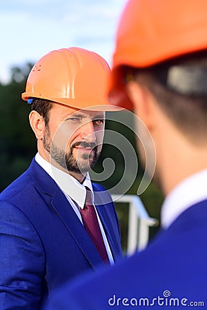 Building and engineering concept. Managers wear smart suits Stock Photo