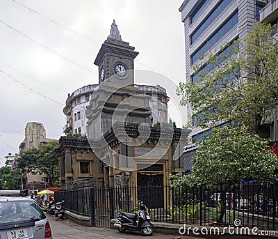 Building erected to the memory of Bomonjee Hormarjee Wadia and clock tower Editorial Stock Photo