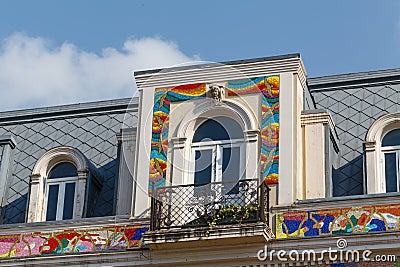 Building facade adorned with mosaic patterns Stock Photo