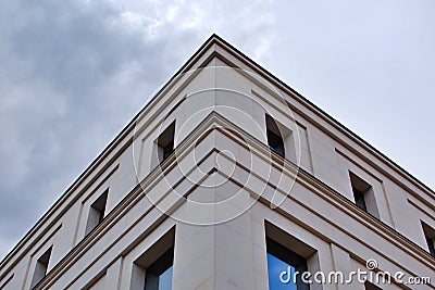 Building facade. Corner of house with windows Stock Photo