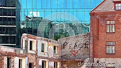 Building facade Sun Reflection graffiti love peace kiss red heart on wall ,modern and old vintage house blue Windows glass a Stock Photo