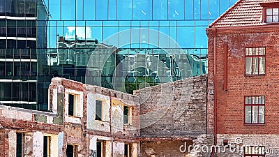Building facade Sun Reflection graffiti wall ,modern and old vintage house blue Windows glass a Stock Photo