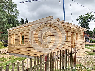 Building family house from spruce logs. Semi finished building Stock Photo