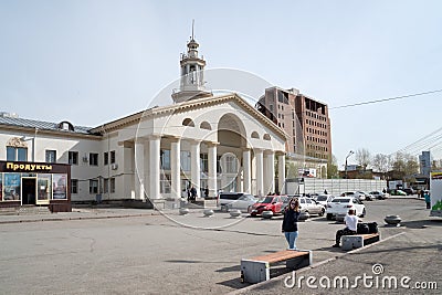 The building of the former first Stalin-era Airport built in 1954 with vehicles on the square in front of it in the city. Editorial Stock Photo