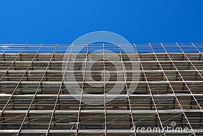 Building front heavily scaffolded for facade renovation Stock Photo