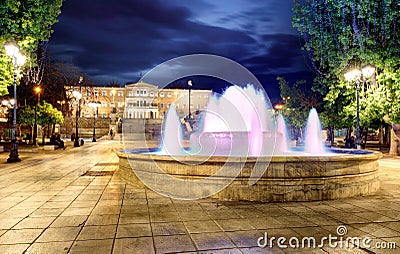 Building of Greek parliament in Syntagma square - fountain, Athens, Greece Editorial Stock Photo