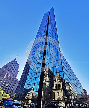 The building at the intersection of Boston, USA, the glass curtain reflects the classical church next to it Editorial Stock Photo