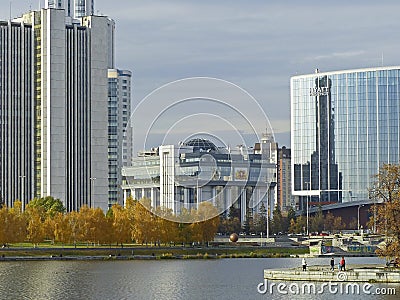 The building of the Legislative Assembly, the hotel `Hayat`. Verkh-Isetskiy pond, promenade, city center, plotinka. Yekaterinburg Editorial Stock Photo