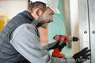 building master with drilling machine Stock Photo