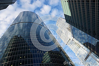 Building in Moscow City reflect each other. Expocenter . Stock Photo