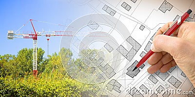 Building a new city - concept image with and drawing an imaginary cadastral map of territory with buildings, fields and roads and Stock Photo