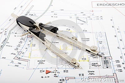 Building plan with pair of compasses and rolling m Stock Photo