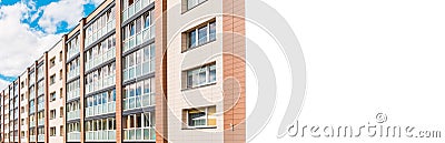 The building,renovated block of flats overlooking balconies.Renovated apartment building,front facade.Banner,white billboard, Stock Photo