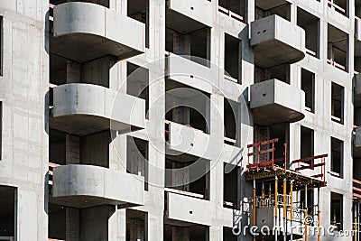 Building shell of apartment building under construction - real estate Stock Photo