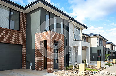 Building of some residential townhouses in a suburb of Australia. The exteriors of some two-story modern Australian suburban homes Stock Photo