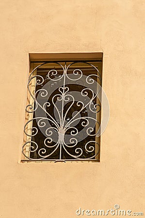 building window1300`s century, iron shield, for protection and security Stock Photo