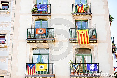 Buildings with Catalonian flags in Barcelona Editorial Stock Photo