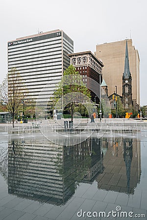 Buildings in downtown reflecting at Public Square, in Cleveland, Ohio Editorial Stock Photo