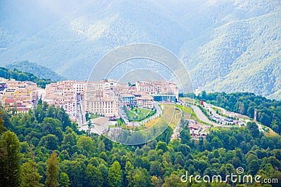 buildings, houses, roads between mountains, top down view. bird's eye view of outdoor recreation in mountains. Editorial Stock Photo