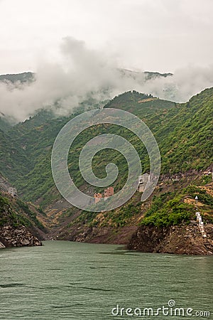 Buildings on mountains edge along Yangtze River Xiling. Shengli Street, China Stock Photo