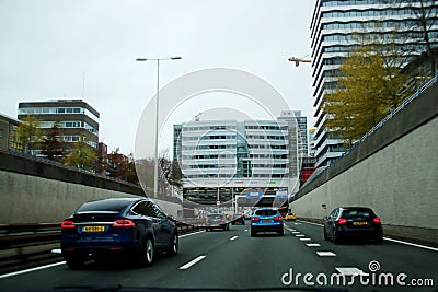 Buildings over the highway A12 named Utrechtsebaan in The Hague in the Netherlands. Editorial Stock Photo