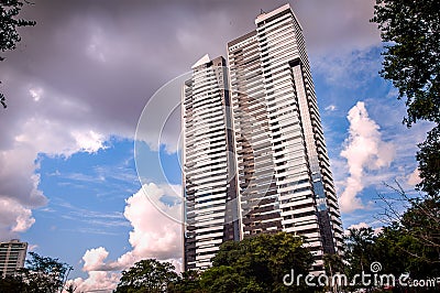 Buildings under the blue skymodern building in the middle of the sky Stock Photo