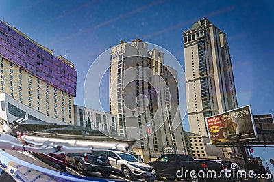 Buildings and vehicles reflections on the windshield of a parked vehicle Editorial Stock Photo
