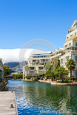 Buildings on the waterfront of Victoria & Alfred, Cape Town, South Africa. Vertical Stock Photo