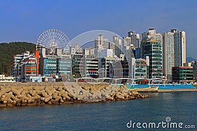 The buildings and the wheel of Busan Editorial Stock Photo