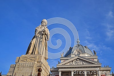 Statue of Mihai Cantacuzino standing holding a sword in front of landmark Coltea Hospital at Bucharest Romania Stock Photo
