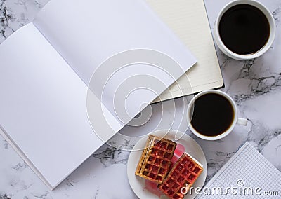 Buisness lunch with two coffe anf waffles and planning the day Stock Photo