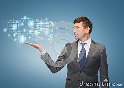 Buisnessman or teacher showing world map hologram Stock Photo