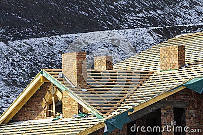 Bukovel, Ukraine - November 27, 2017: New modern house under con Editorial Stock Photo