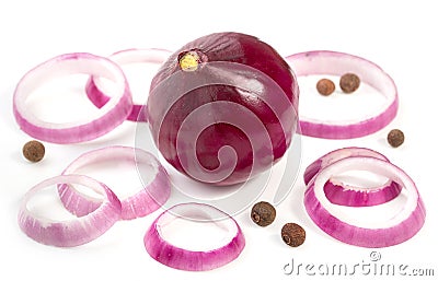 Bulb and ring slices of red onion, allspice, isolated on a white background Stock Photo