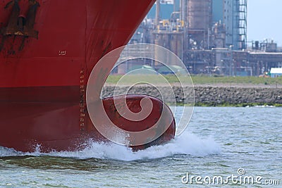 Bulbous bow of a ship with wave breaking Stock Photo