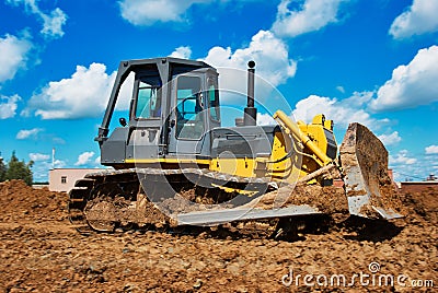 Buldozer moving earth. Road construction building work Stock Photo