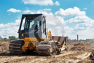 Buldozer moving earth. Road construction building work Editorial Stock Photo