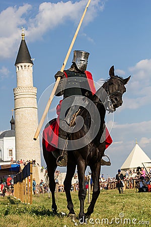 Bulgar, Russian Federation - August 2018, - man in armor on horseback at the festival of the middle ages against the Editorial Stock Photo