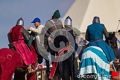 Bulgar, Russian Federation - August 2018, - men in knightly costumes on horses before the show Editorial Stock Photo