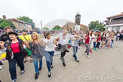 Bulgaria, village of Bulgarians. Young lovers of national dances on Nestenar games Editorial Stock Photo