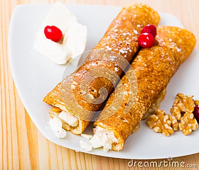 Bulgarian dish of pancakes with filling from brynza and walnuts Stock Photo