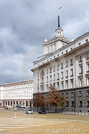 A Bulgarian flag flies above the former Bulgarian Communist Party headquarters in Sofia, Bulgaria Editorial Stock Photo