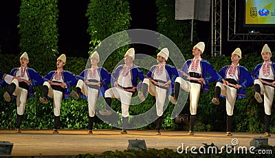 Bulgarian folkloric dancers at stage Editorial Stock Photo