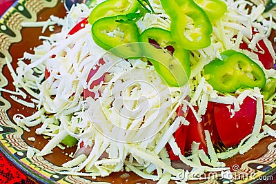 Bulgarian Shopsky Salad made of tomatoes, cucumbers and cheese Stock Photo