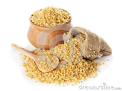 Bulgur in a bag and clay bowl Stock Photo